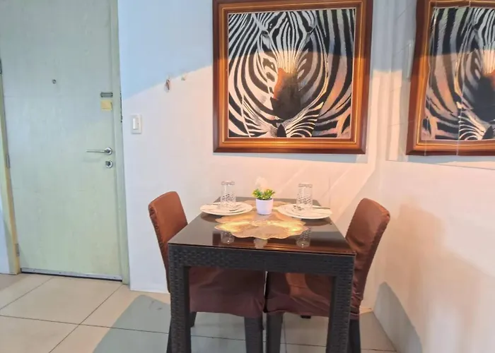 Holiday home Cozy Corner Unit Balcony With Pool View *