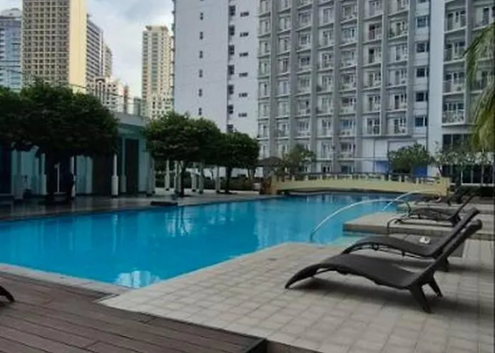 Holiday home Cozy Corner Unit Balcony With Pool View Manila
